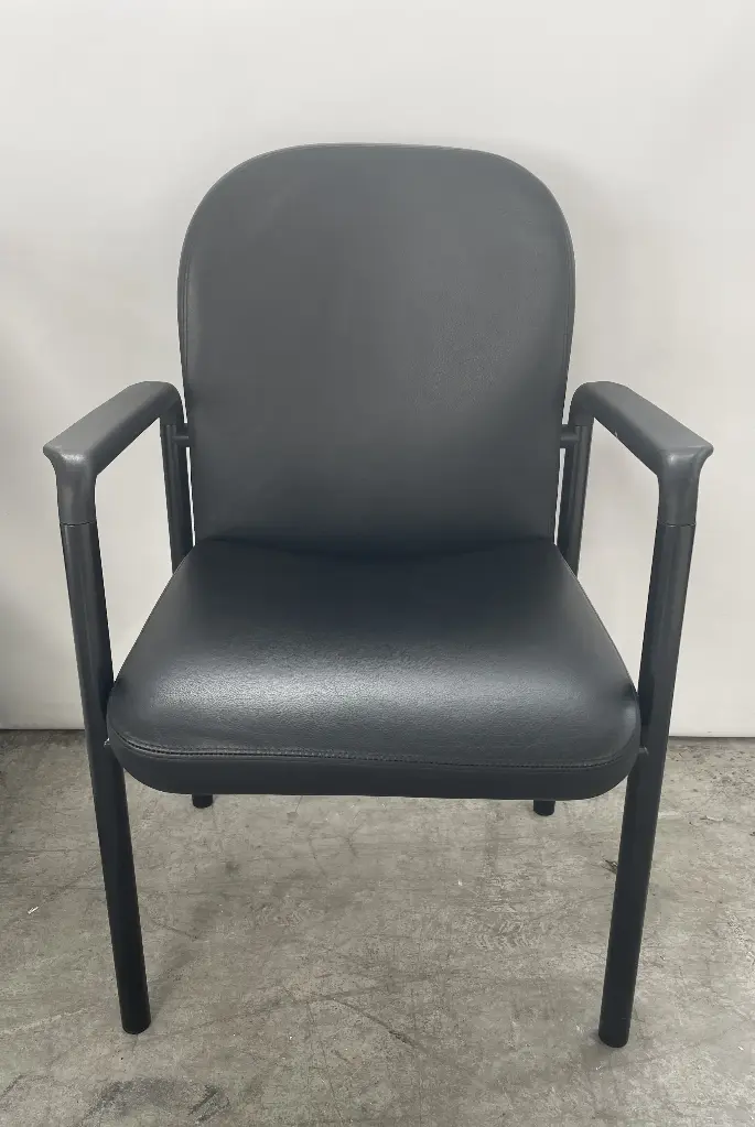 Martin Stoll black leather reception armchair