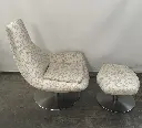 Swivel armchair with comfortable footstool