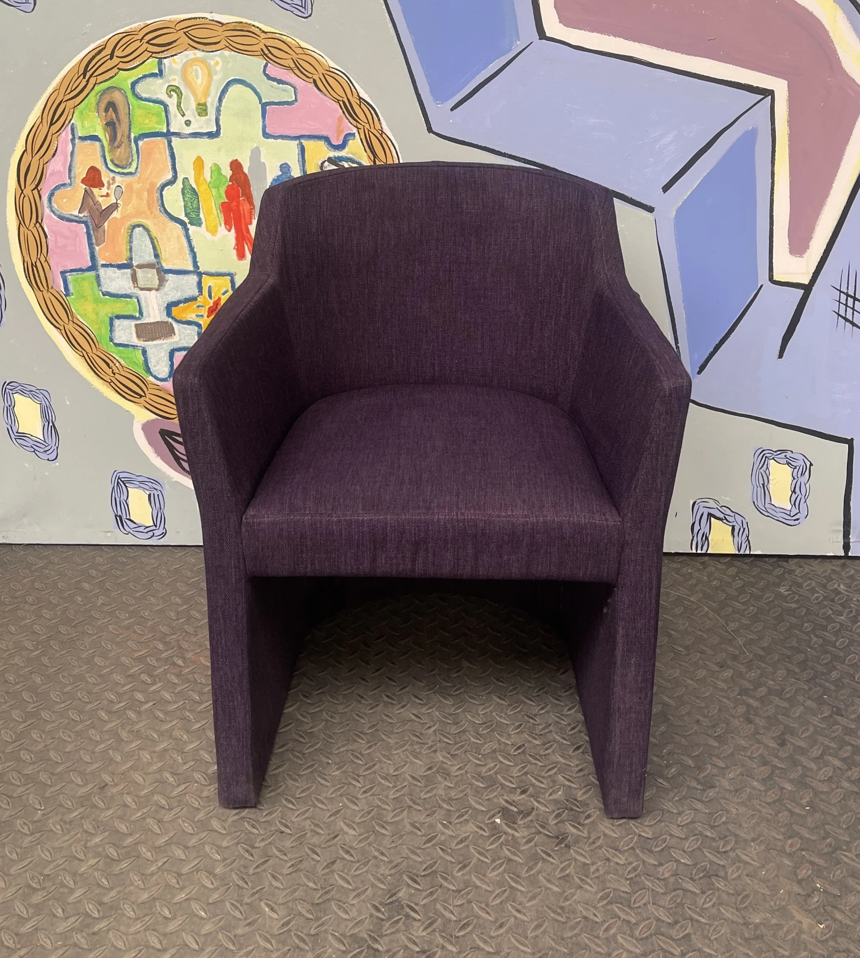 Fauteuil en tissu violet